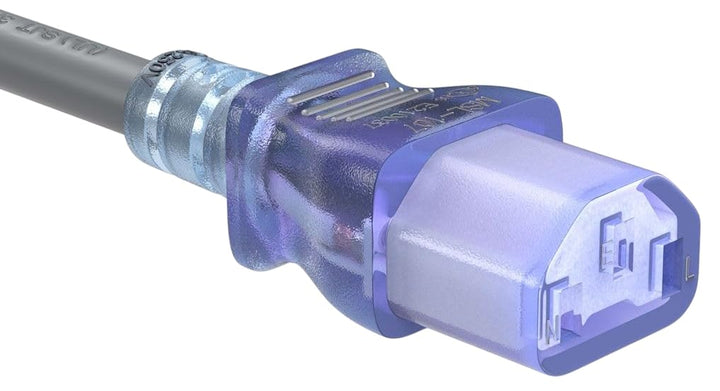 Close-up of a gray and purple electrical plug on a white background